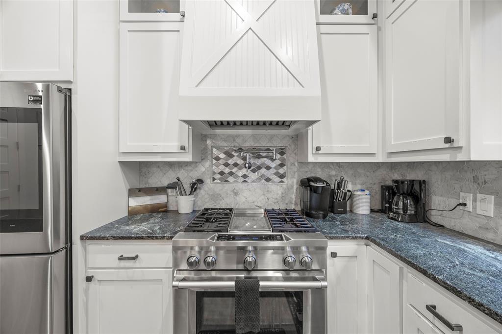 2009 North Prairie Avenue, Unit 2009 Dallas, TX 75204 - Photo 12 of 40 Gas stove with griddle with a convenient pot filler
