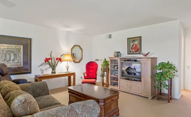 a bathroom with a sink double vanity and a mirror