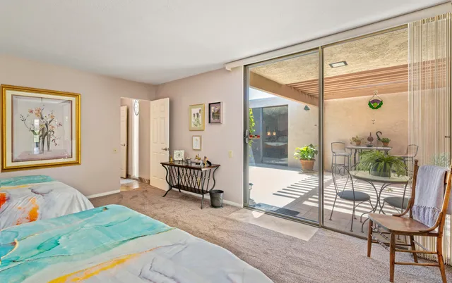 a bathroom with a sink vanity granite and a mirror