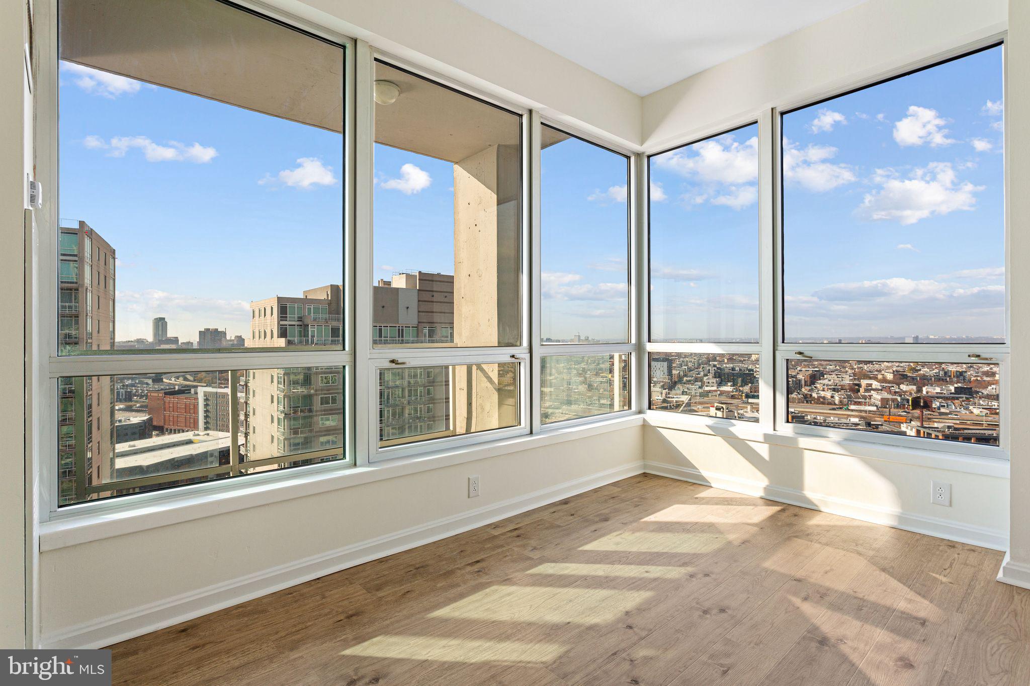901 North Penn Street, Unit R2203 Philadelphia, PA 19123 - Photo 17 of 58 a view of an empty room and window