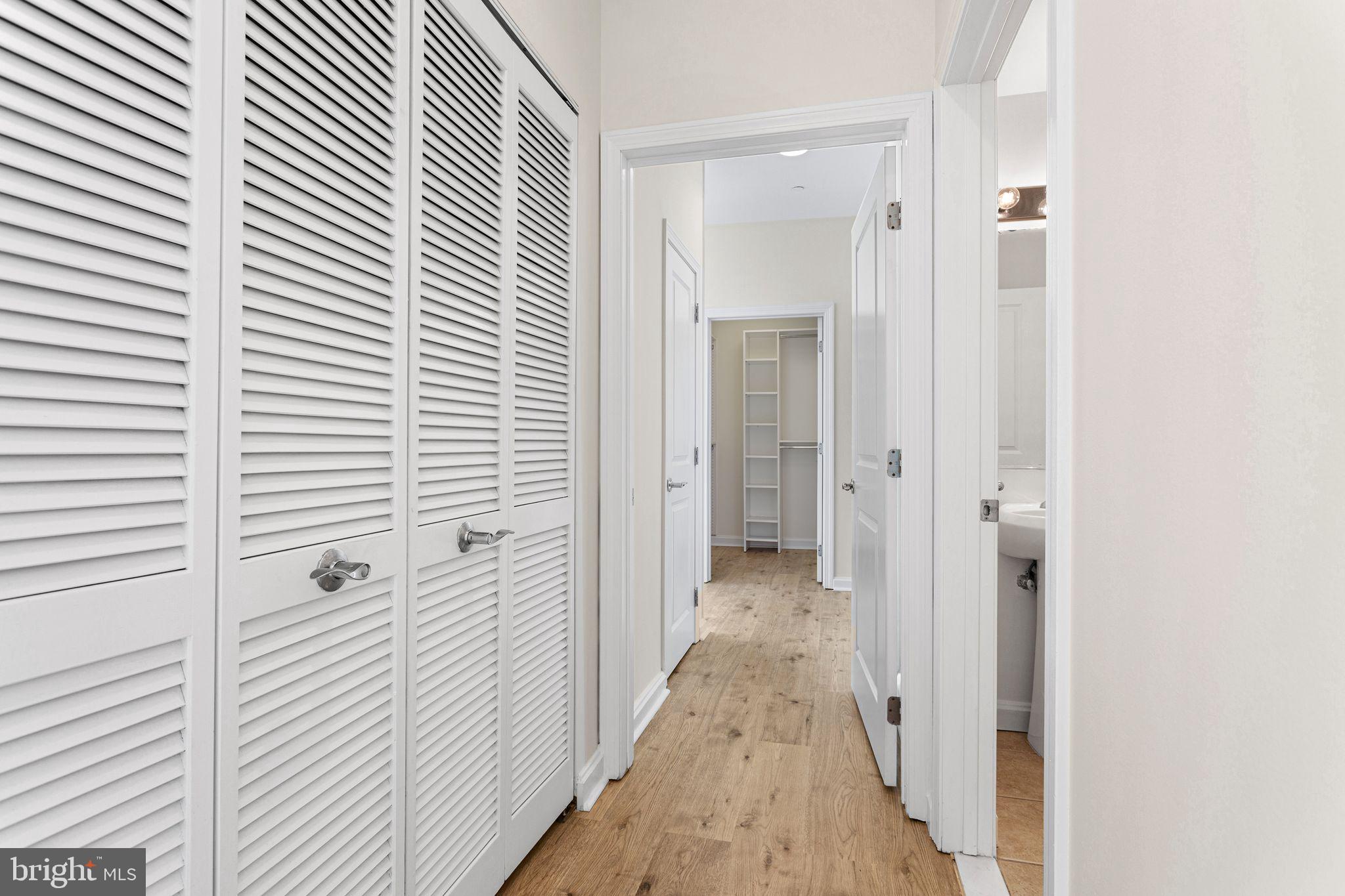 901 North Penn Street, Unit R2203 Philadelphia, PA 19123 - Photo 22 of 58 a view of a bathroom from the hallway