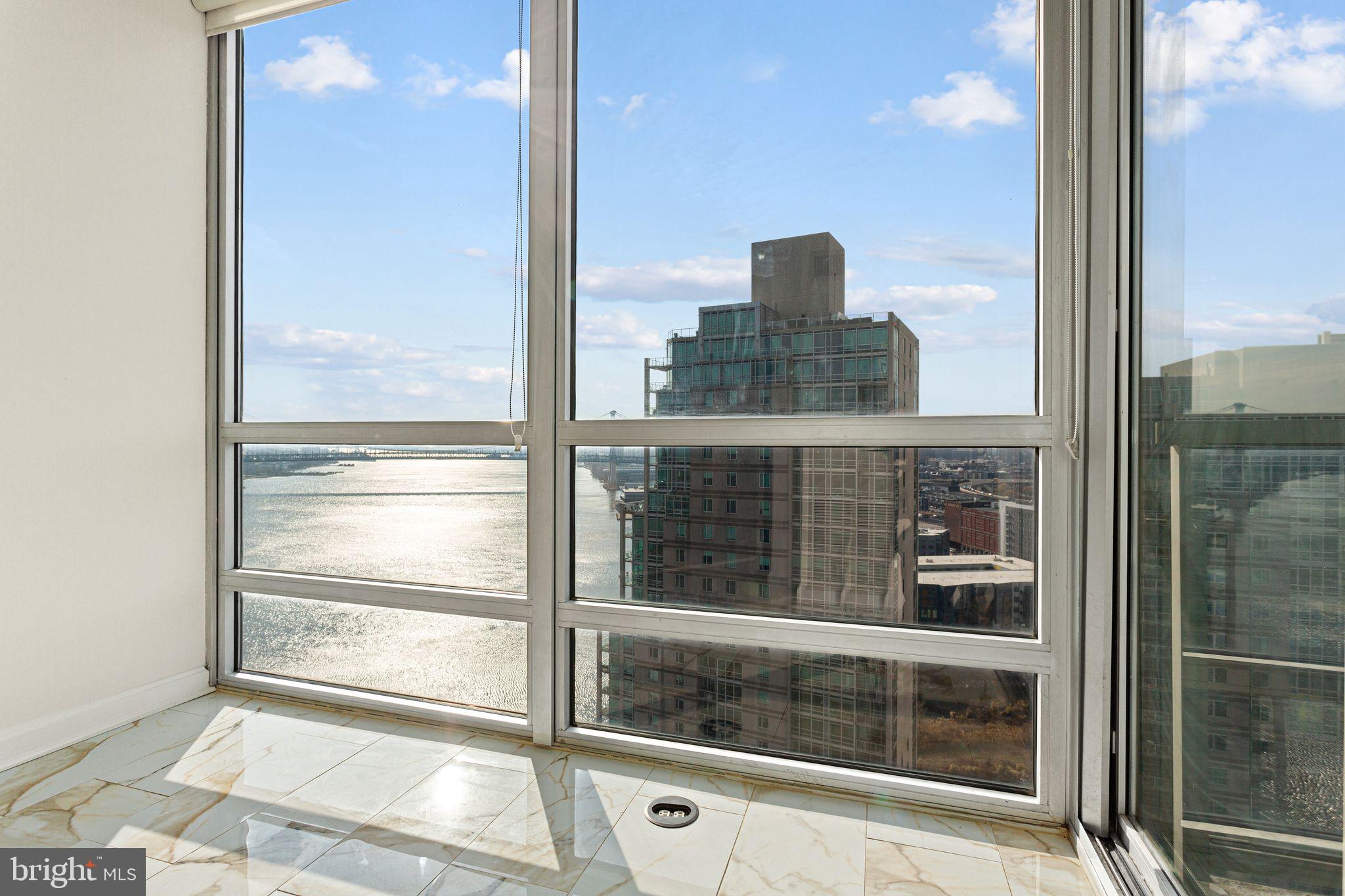 901 North Penn Street, Unit R2203 Philadelphia, PA 19123 - Photo 8 of 58 a picture of a glass door