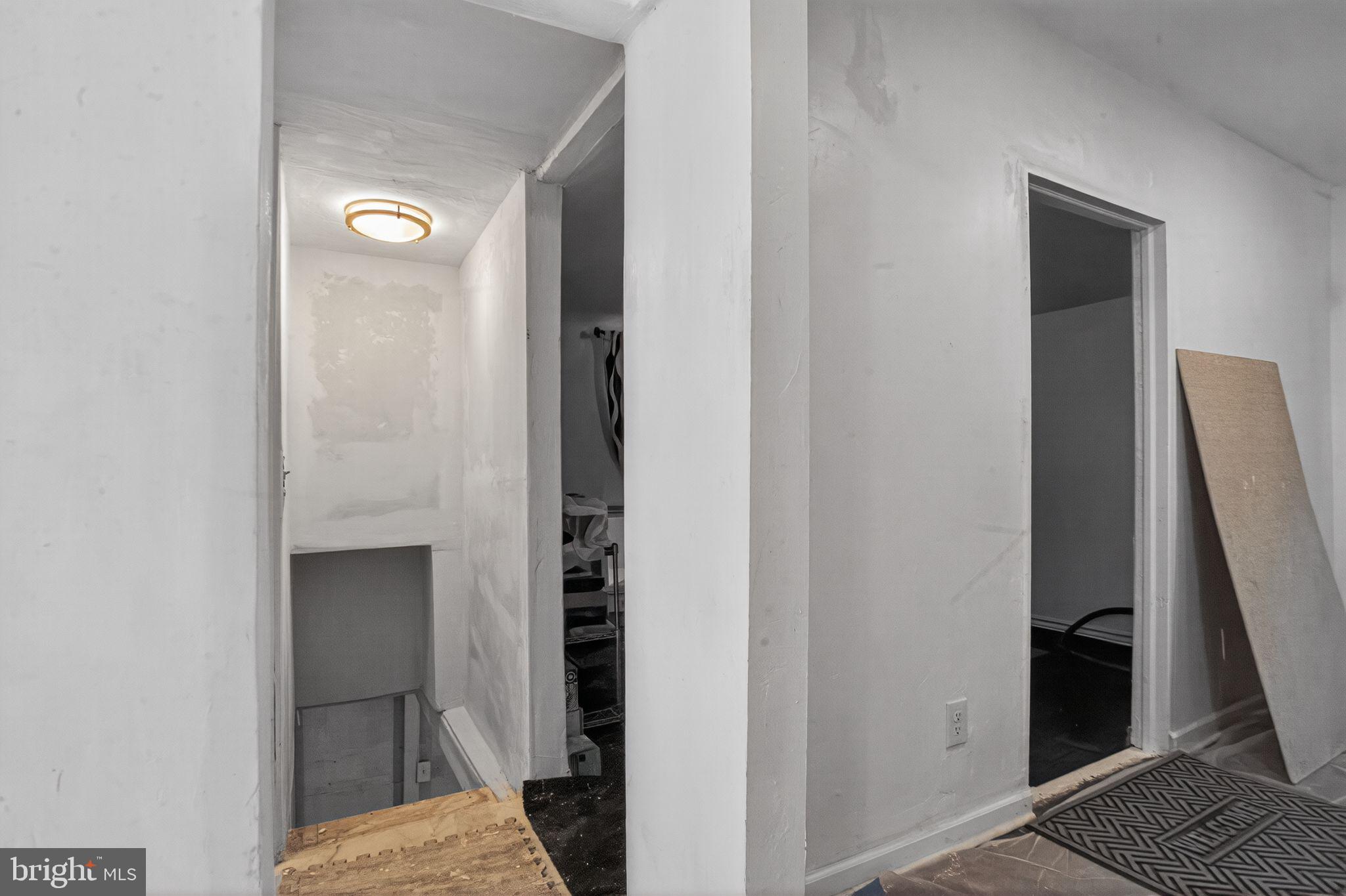 259 Shoemaker Lane Bridgeton, NJ 08302 - Photo 16 of 23 a view of hallway with sink and a closet