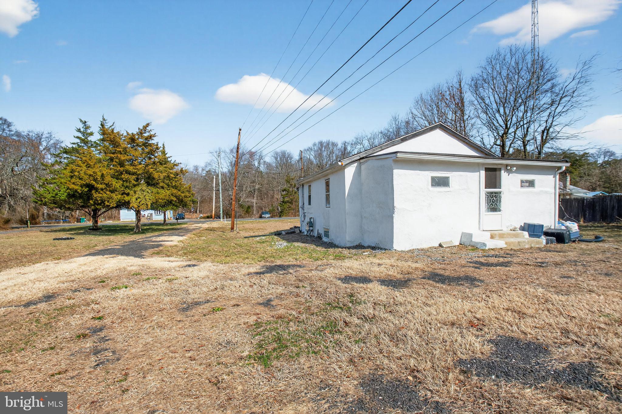 259 Shoemaker Lane Bridgeton, NJ 08302 - Photo 4 of 23 a view of a house with a yard