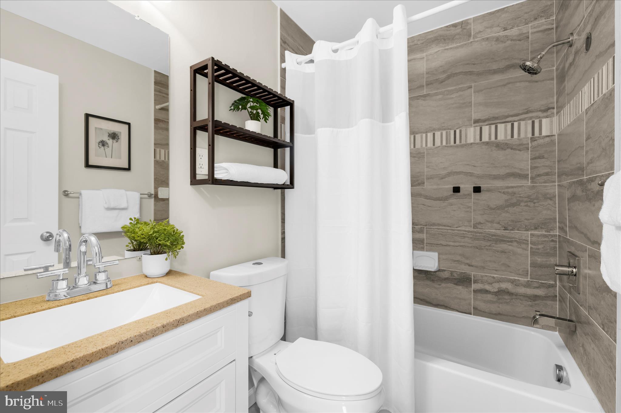 9008 Townsend Lane Clinton, MD 20735 - Photo 14 of 48 a bathroom with a sink a toilet and shower