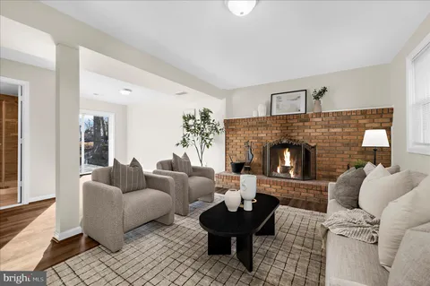 a view of an empty room and wooden floor