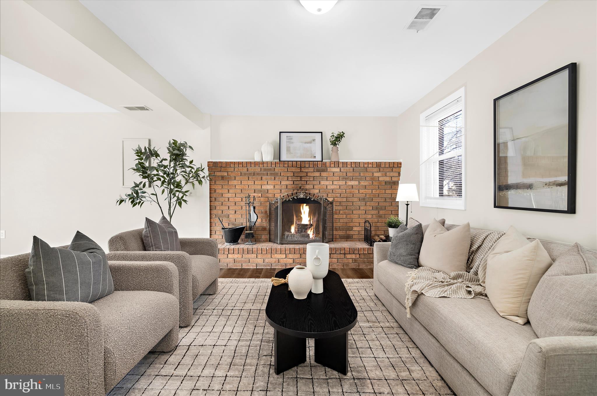 9008 Townsend Lane Clinton, MD 20735 - Photo 26 of 48 a living room with furniture and a fireplace