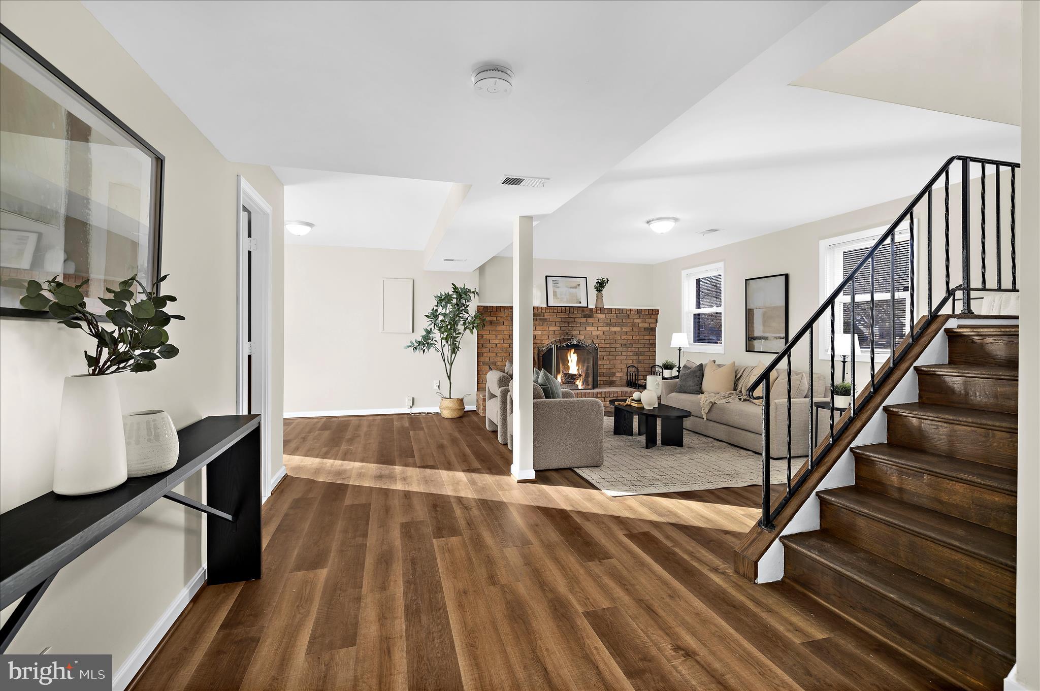 9008 Townsend Lane Clinton, MD 20735 - Photo 29 of 48 a view of dining room with furniture and wooden floor