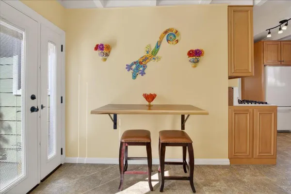a view of dining room and wooden floor