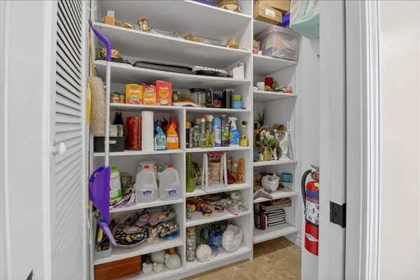 a room with storage and utility