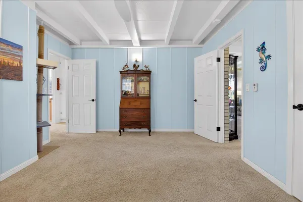 a view of a workspace with furniture and a livingroom