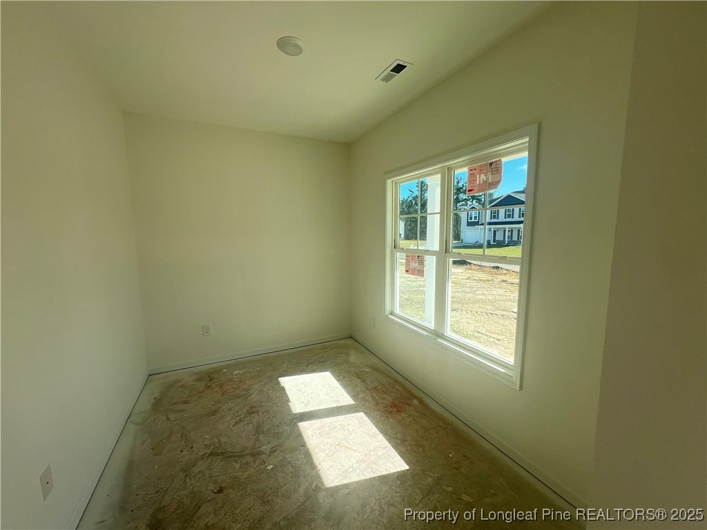 415 Traveller Way Raeford, NC 28376 - Photo 16 of 18 a view of hallway with windows
