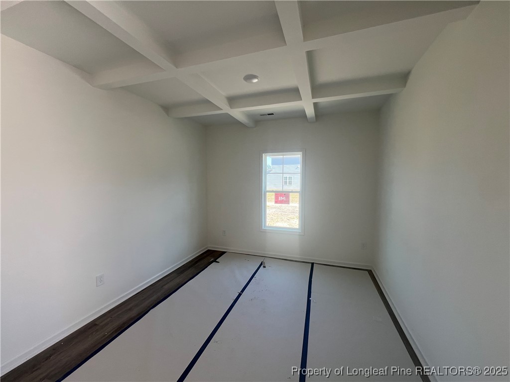 415 Traveller Way Raeford, NC 28376 - Photo 9 of 18 an empty room with windows