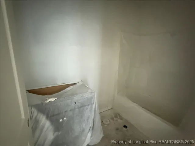 a room with workbench and window