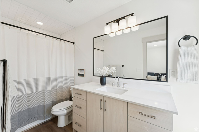51 East 200 North, Unit 3 Bountiful, UT 84010 - Photo 17 of 27 Full bath with vanity, dark wood-type flooring, and recessed lighting