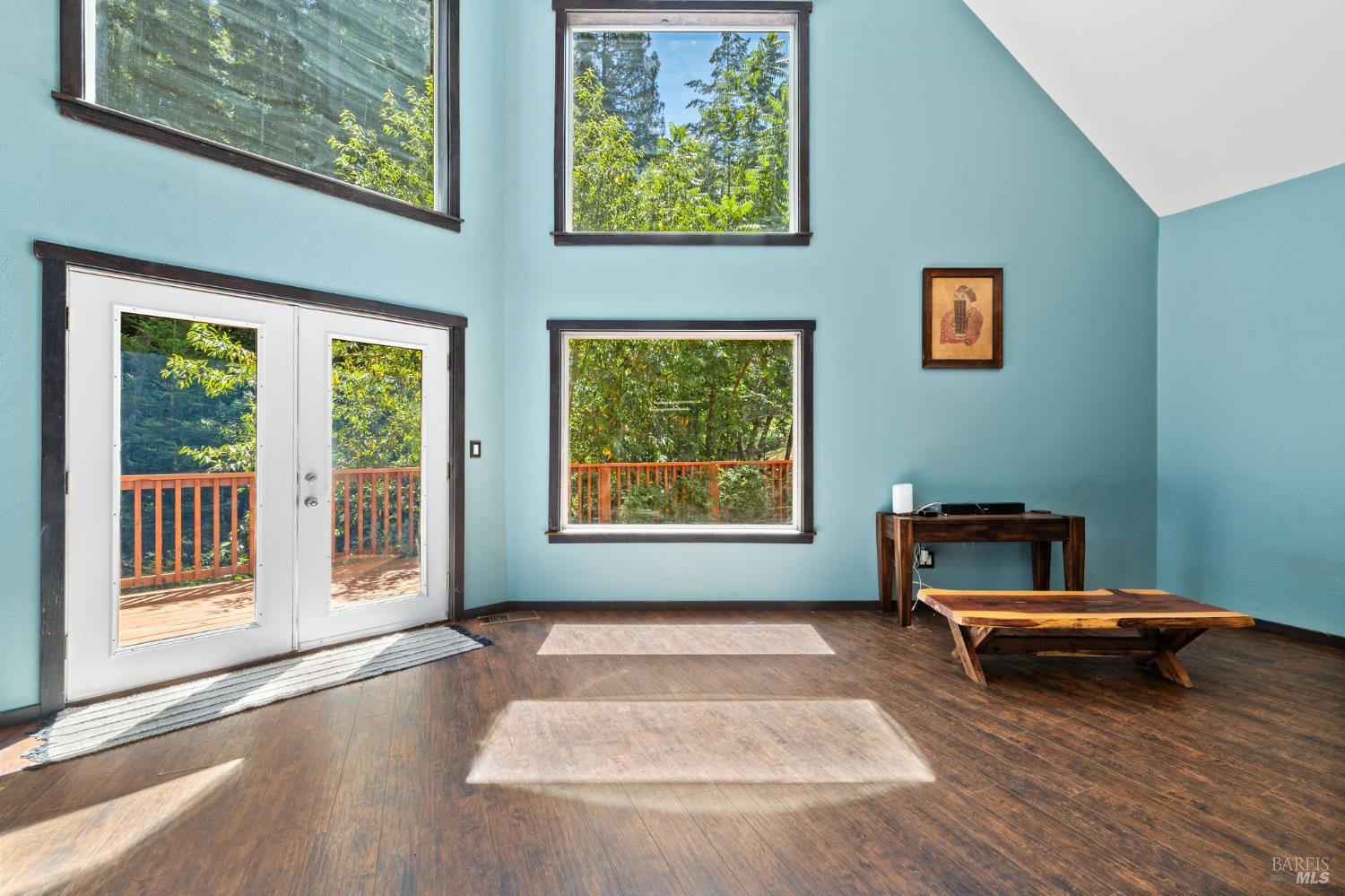 9935 Occidental Road Sebastopol, CA 95472 - Photo 12 of 59 Large picture windows and French doors allow for great views of the redwoods