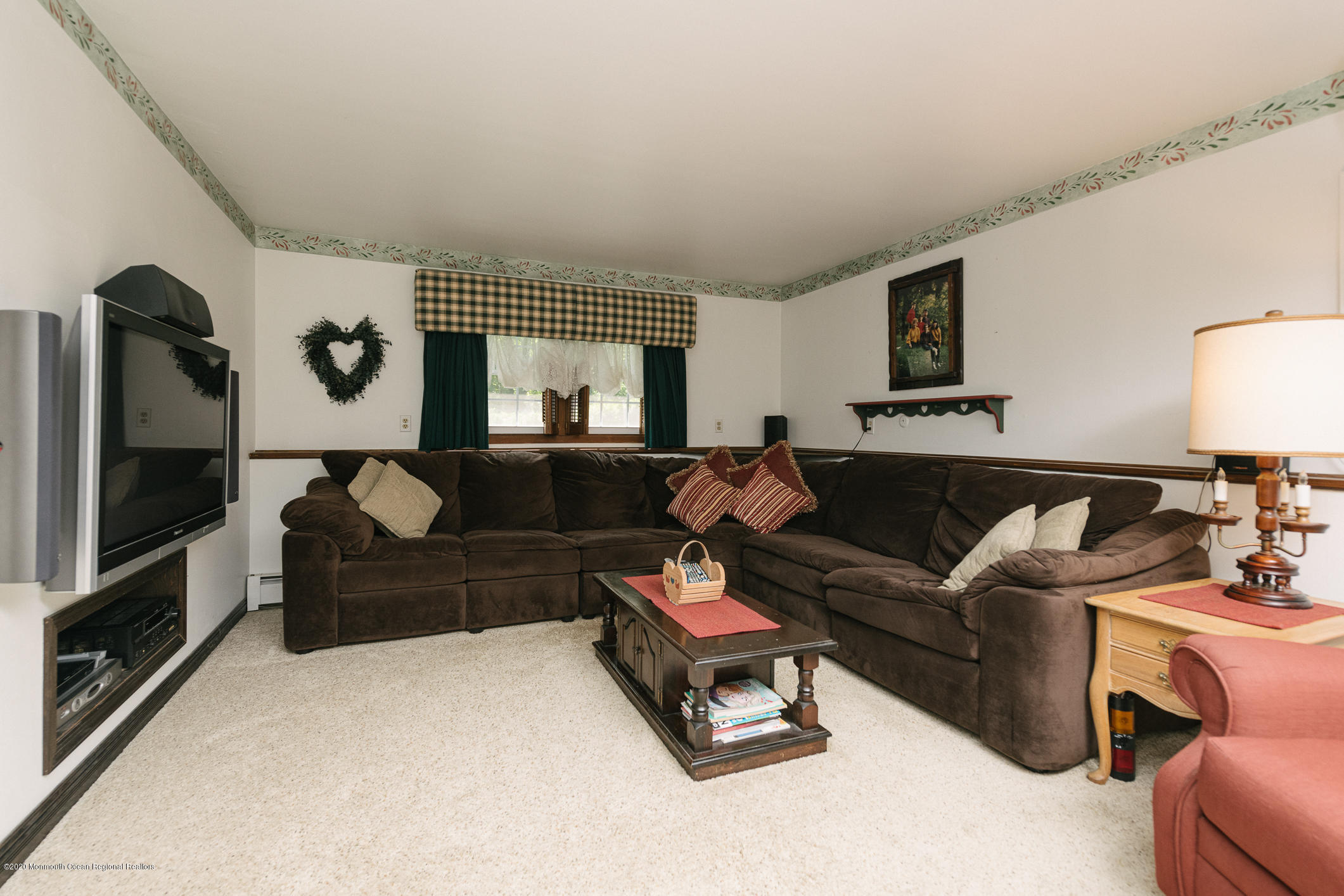 356 Cherry Quay Road Brick, NJ 08723 - Photo 19 of 31 a living room with furniture and a flat screen tv