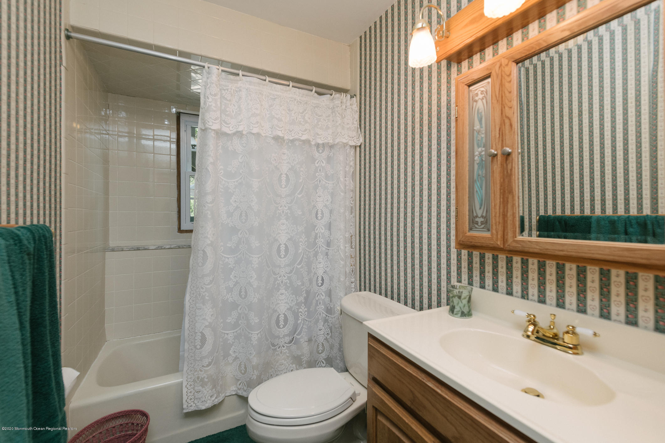 356 Cherry Quay Road Brick, NJ 08723 - Photo 24 of 31 a bathroom with a sink a toilet and shower