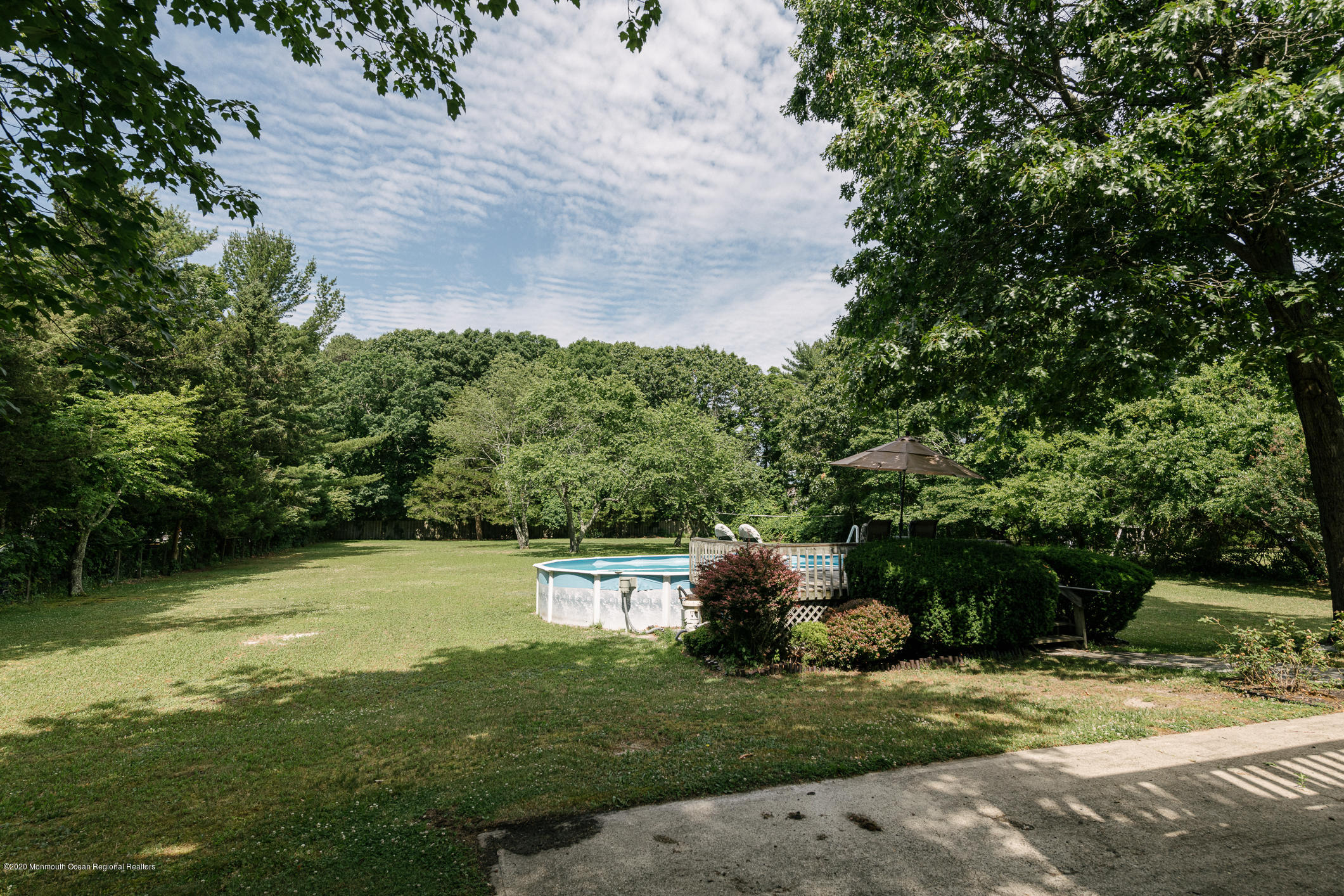 356 Cherry Quay Road Brick, NJ 08723 - Photo 26 of 31 a view of a backyard