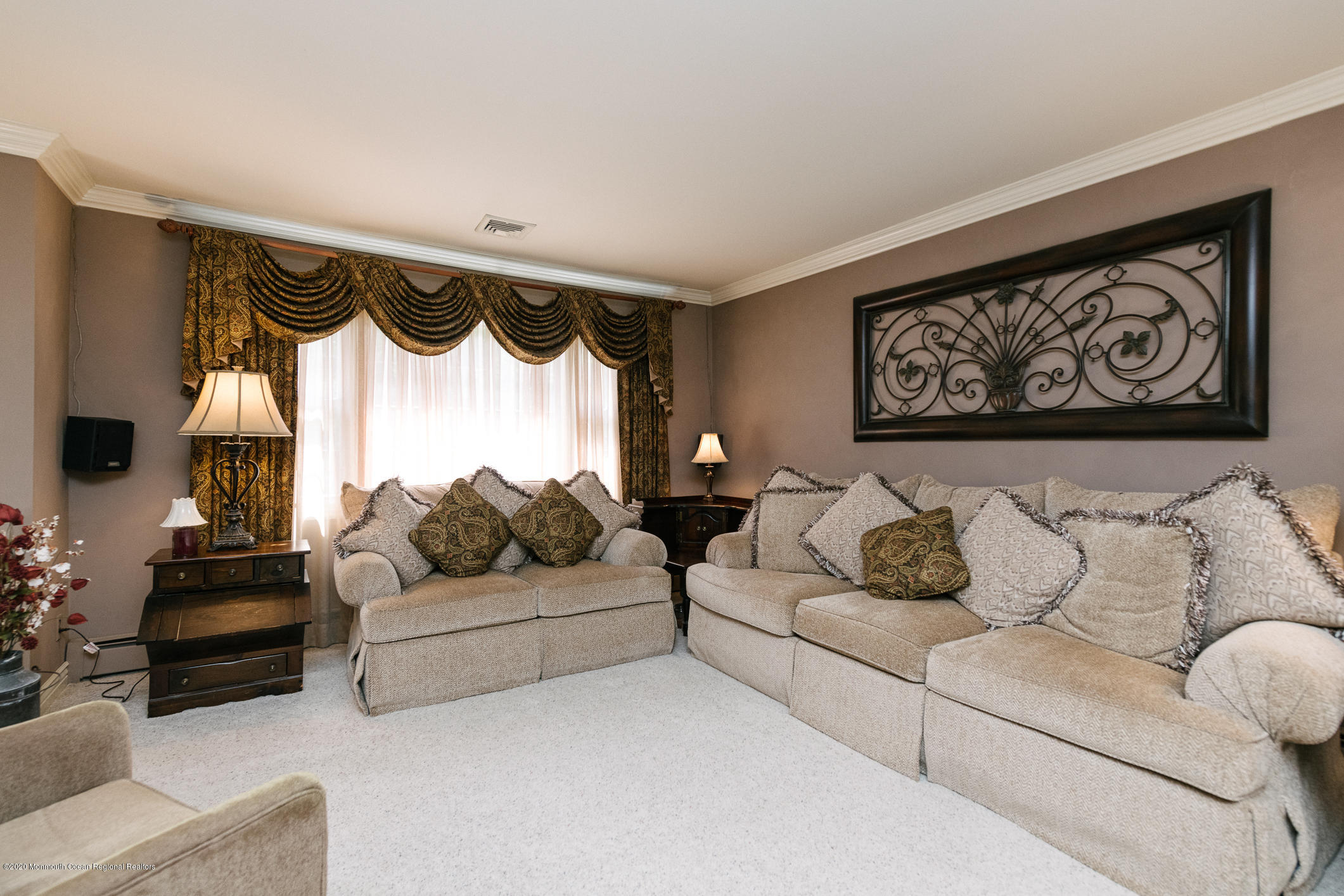 356 Cherry Quay Road Brick, NJ 08723 - Photo 4 of 31 a living room with furniture and a large window