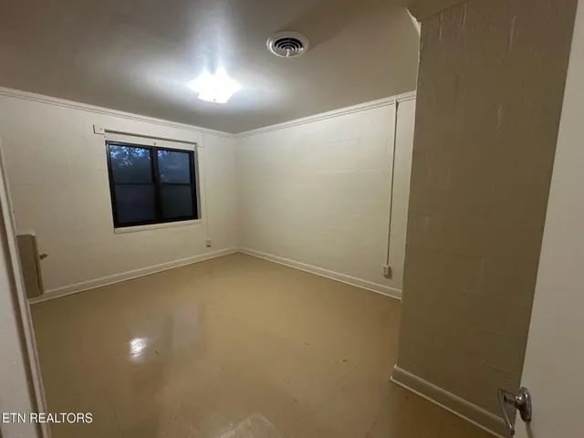 an empty room with a window