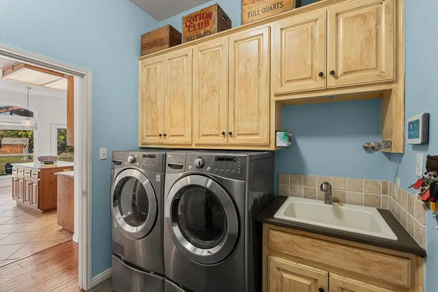 a utility room with dryer and washer