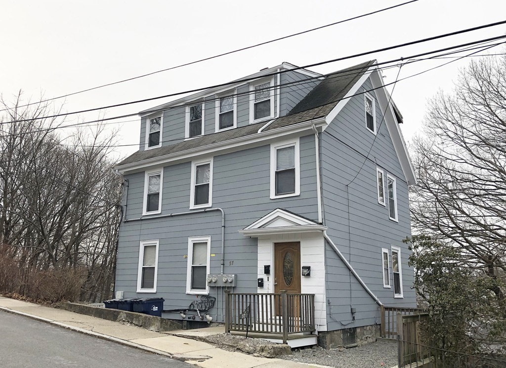 5-7 Hemman Street Boston, MA 02131 - Photo 2 of 11 a view of a house with a street
