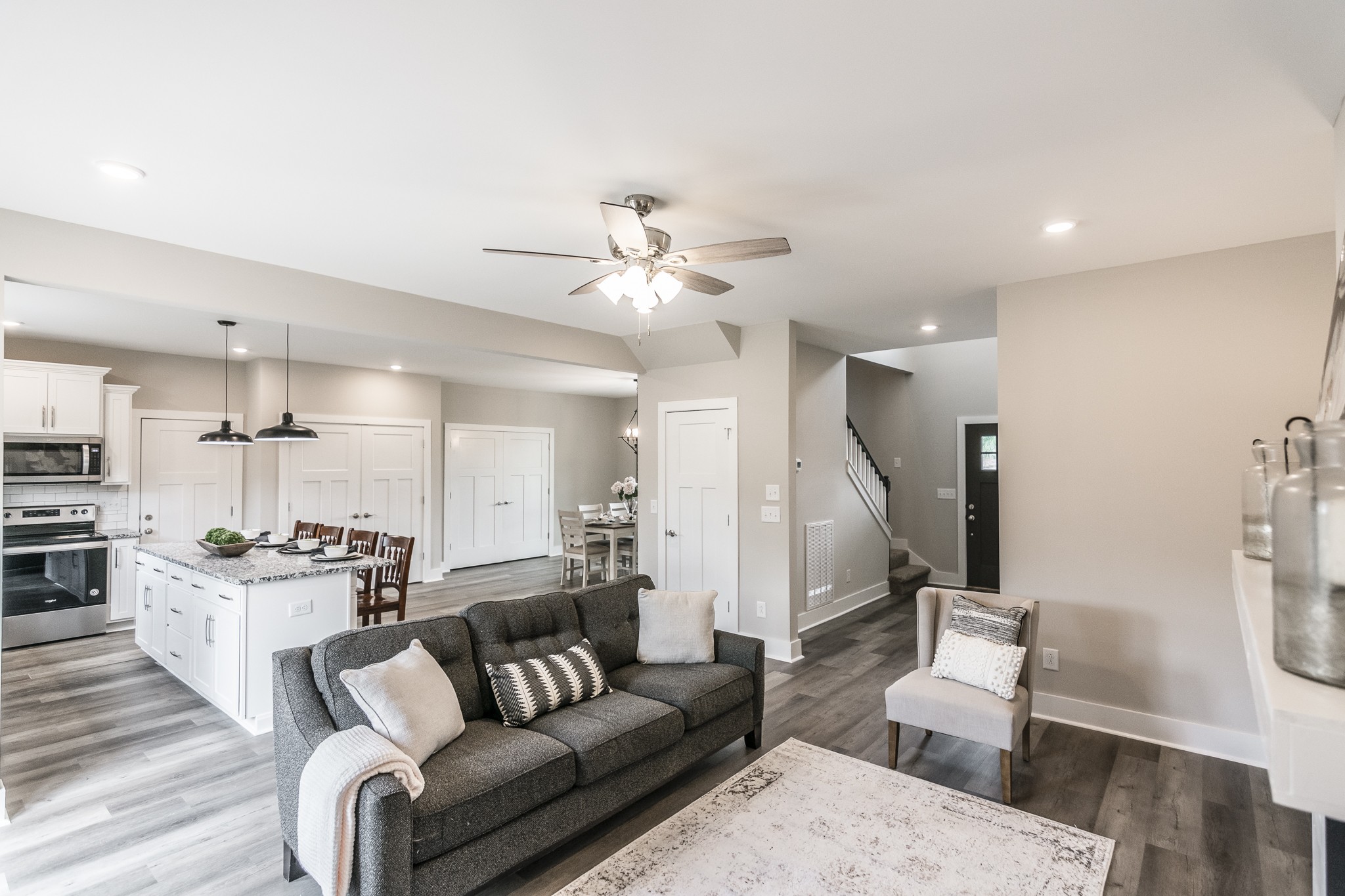 4839 Pulliam-Hardaway Road Springfield, TN 37172 - Photo 13 of 40 a living room with furniture kitchen view and a chandelier