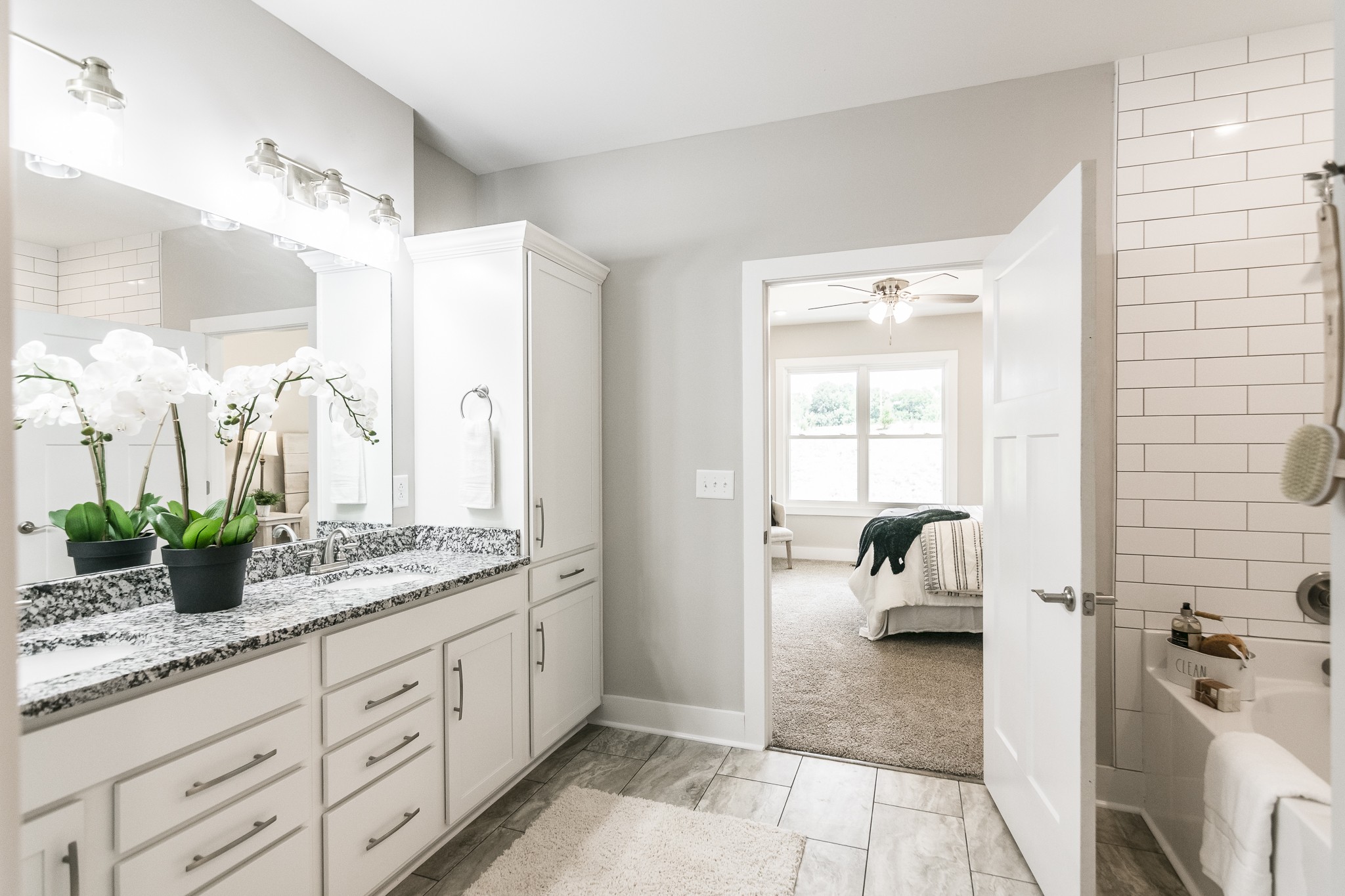 4839 Pulliam-Hardaway Road Springfield, TN 37172 - Photo 28 of 40 a spacious bathroom with a granite countertop sink and a mirror