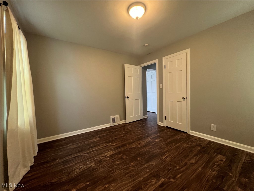 20611 Franklin Road Maple Heights, OH 44137 - Photo 21 of 31 Bedroom featuring dark hardwood / wood-style flooring