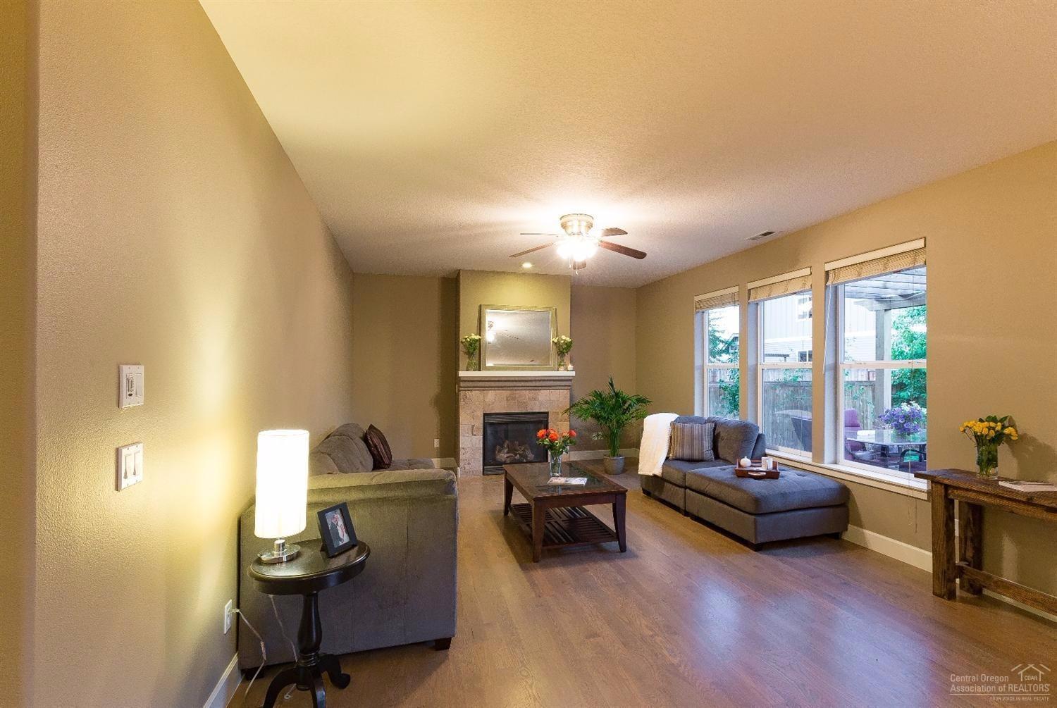 61468 Brosterhous Road Bend, OR 97702 - Photo 4 of 18 The fireplace adds atmosphere while the