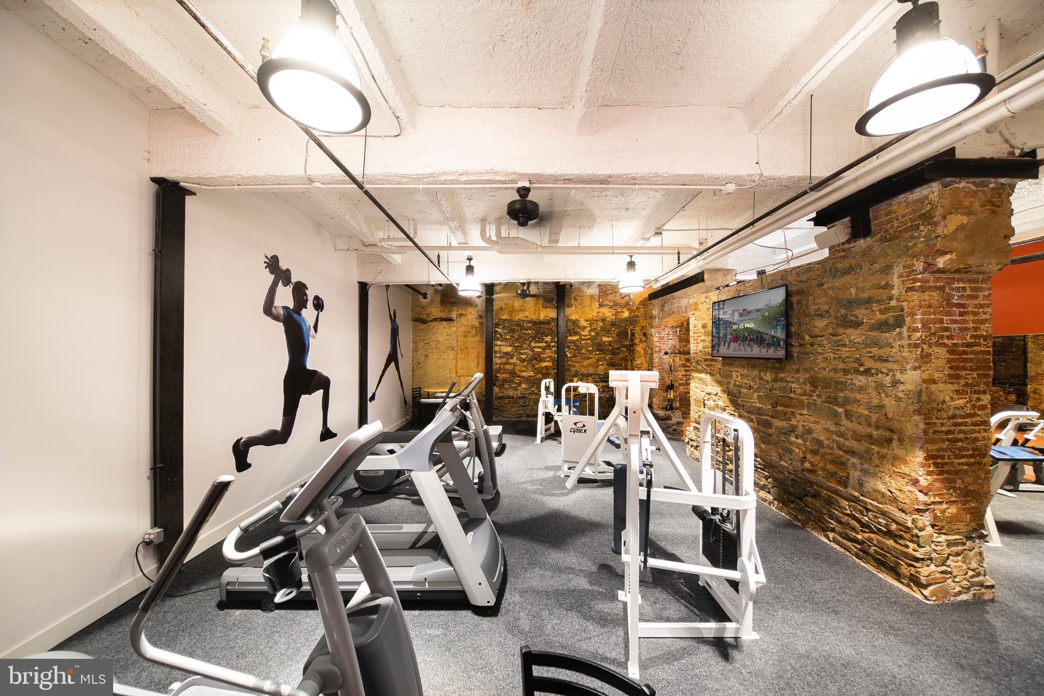 521 St Paul Street, Unit 2BR Baltimore, MD 21202 - Photo 13 of 44 a view of a room with gym equipment