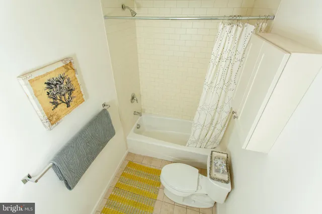 a kitchen with a sink and large window