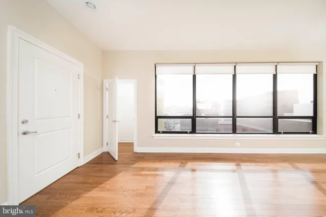 an empty room with windows