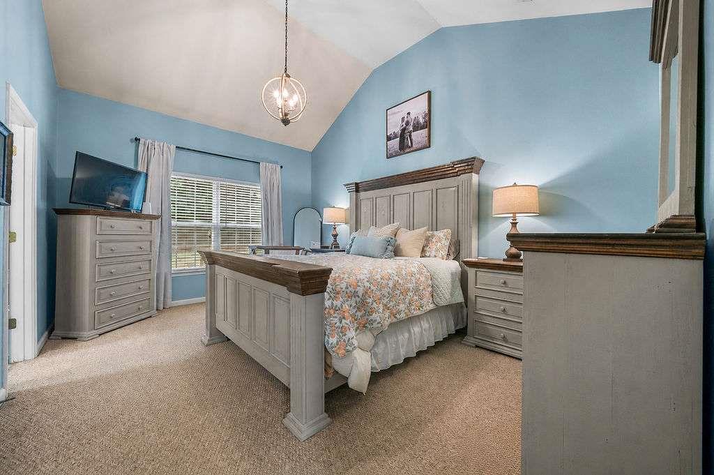 45 Highlander Trail Southwest Rome, GA 30165 - Photo 22 of 32 a bedroom with a bed and a television