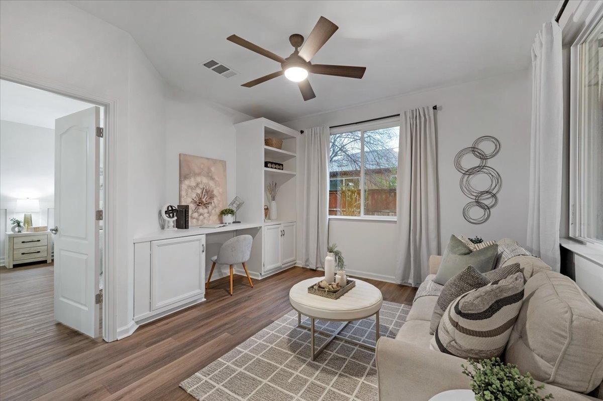 3755 Richmond Avenue Clovis, CA 93619 - Photo 12 of 30 a living room with furniture and a wooden floor