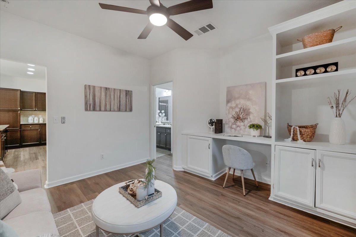 3755 Richmond Avenue Clovis, CA 93619 - Photo 14 of 30 a living room with furniture and a wooden floor