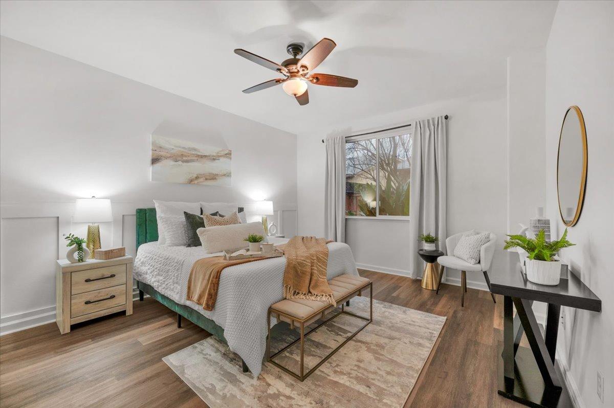 3755 Richmond Avenue Clovis, CA 93619 - Photo 16 of 30 a bedroom with a bed and wooden floor