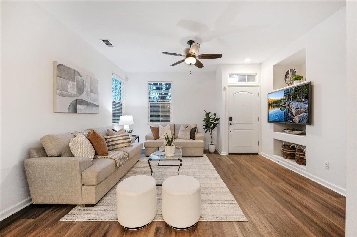 3755 Richmond Avenue Clovis, CA 93619 - Photo 2 of 30 a living room with furniture and a flat screen tv