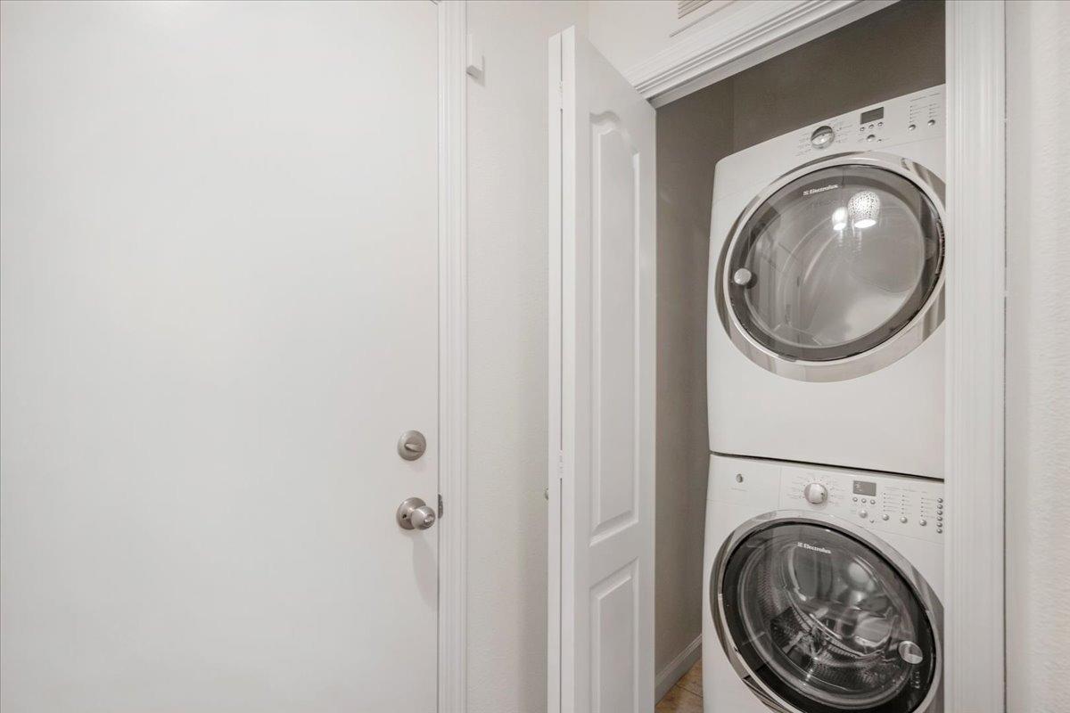 3755 Richmond Avenue Clovis, CA 93619 - Photo 24 of 30 a view of a hallway with washer and dryer
