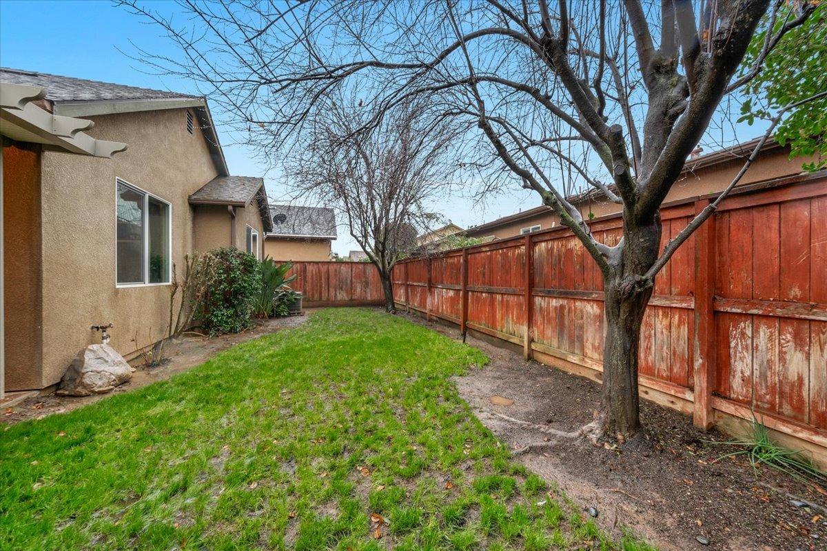 3755 Richmond Avenue Clovis, CA 93619 - Photo 28 of 30 a view of a house with a yard