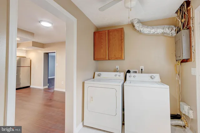 a view of a house with a yard and garage