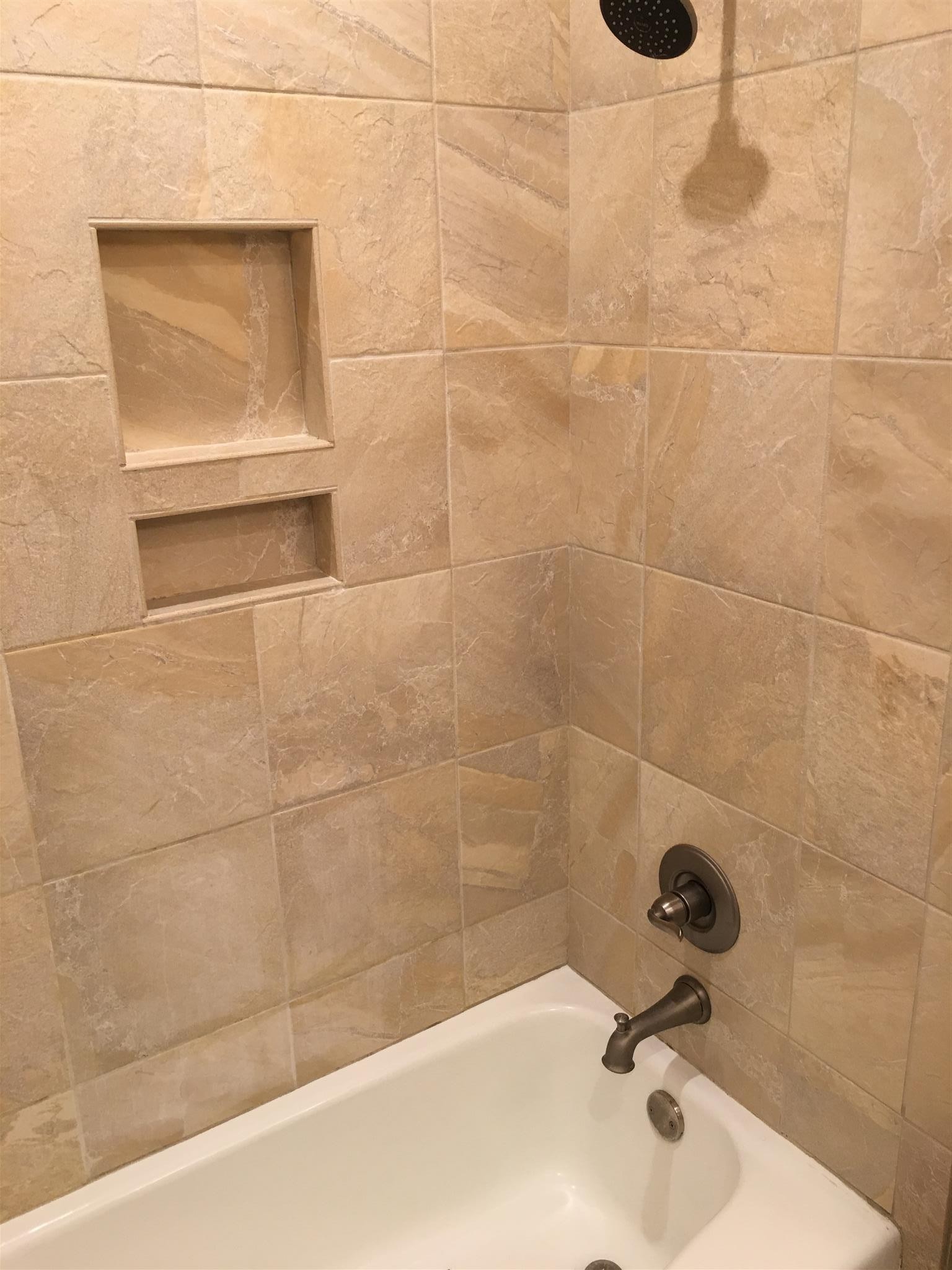 517 Sloan Road Nashville, TN 37209 - Photo 12 of 25 a bathroom with a bathtub