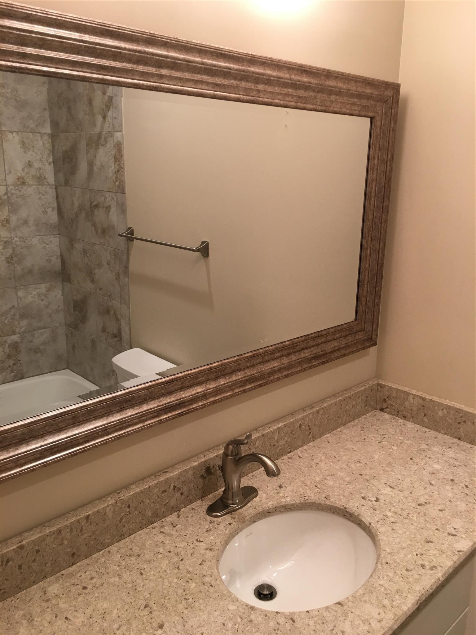 517 Sloan Road Nashville, TN 37209 - Photo 15 of 25 a bathroom with a sink and mirror