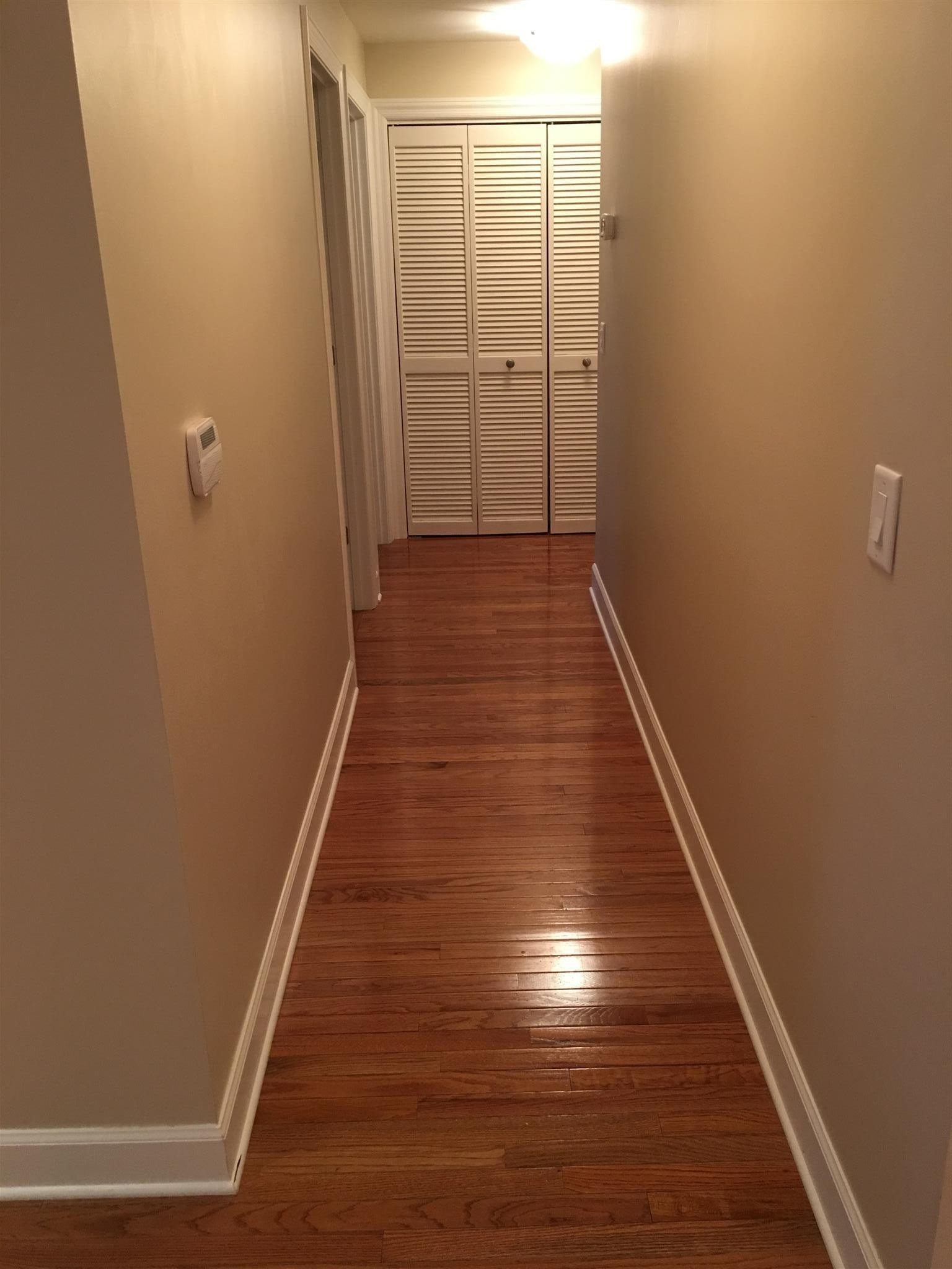 517 Sloan Road Nashville, TN 37209 - Photo 3 of 25 a view of a hallway with wooden floor