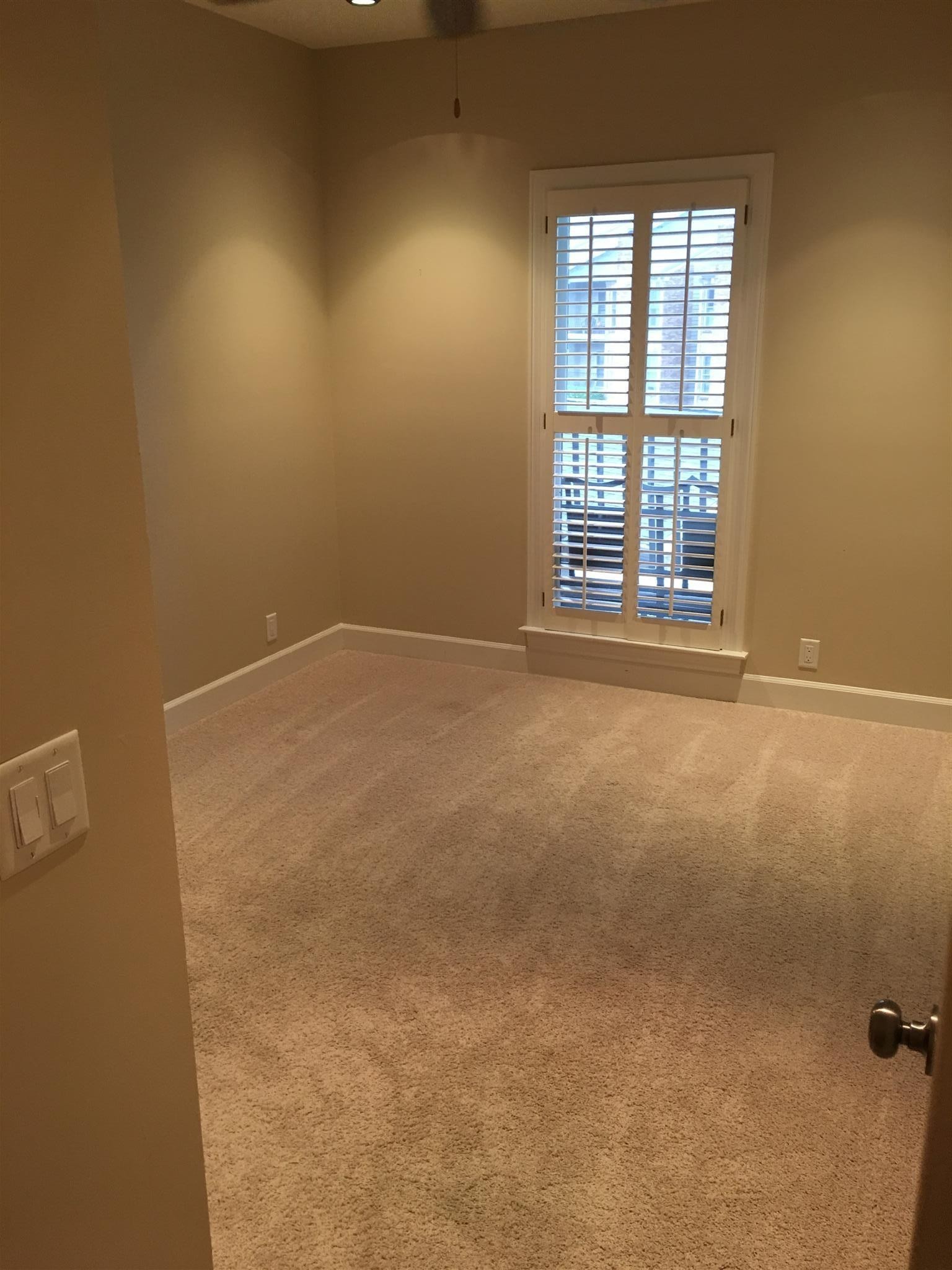 517 Sloan Road Nashville, TN 37209 - Photo 5 of 25 an empty room with windows