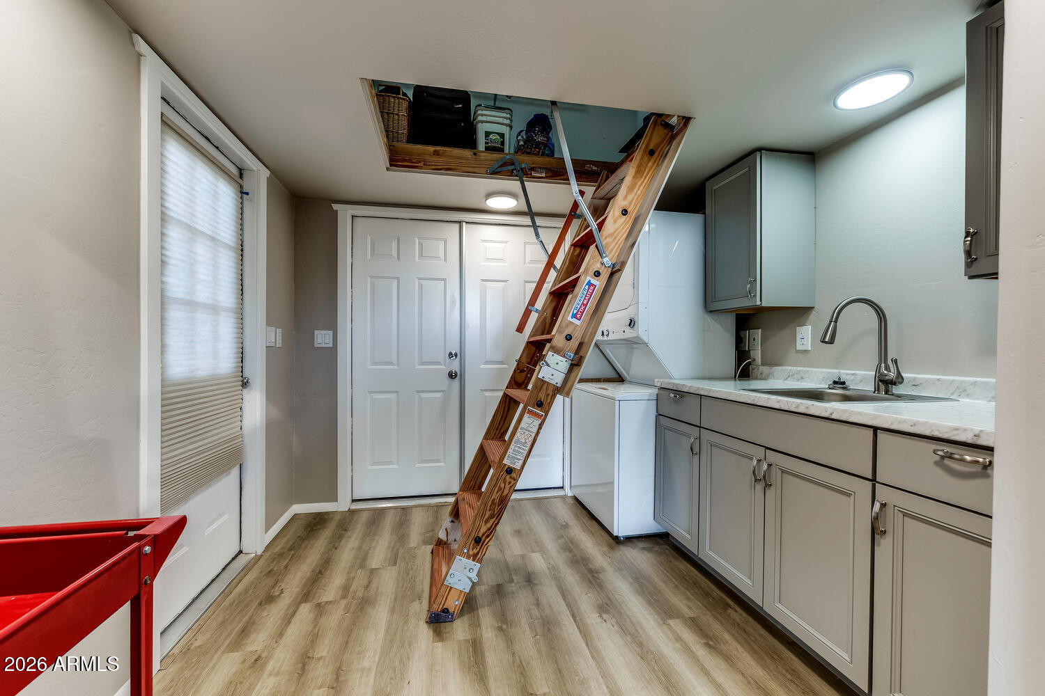 17200 West Bell Road, Unit 722 Surprise, AZ 85374 - Photo 11 of 19 a view of a hallway with wooden floor and staircase