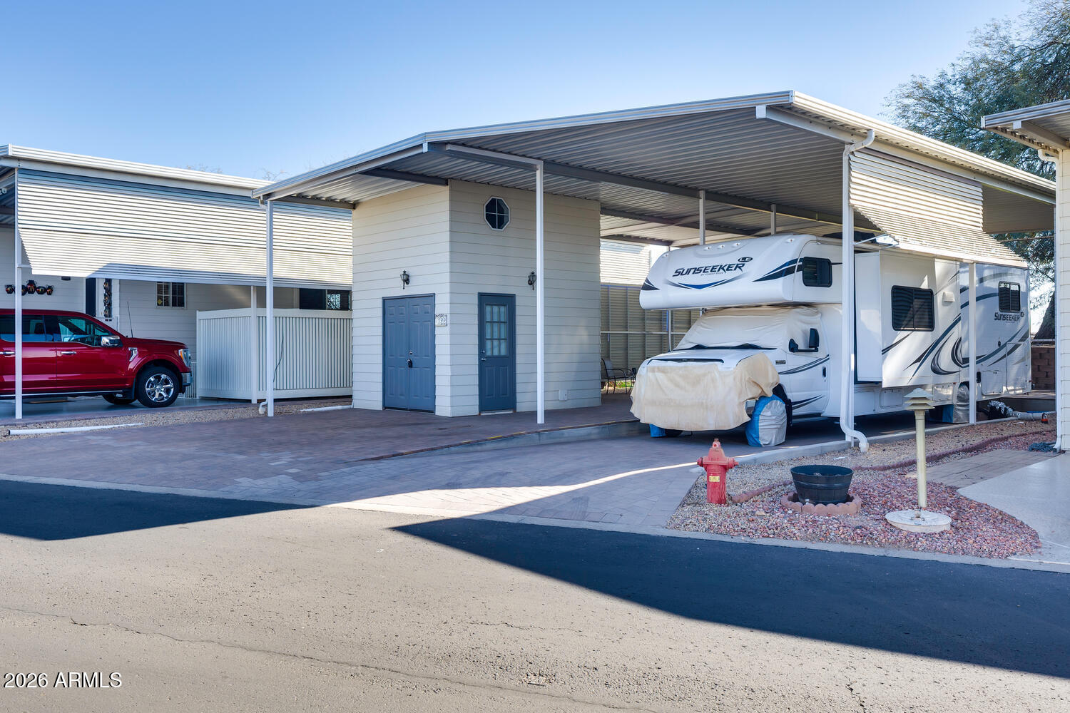 17200 West Bell Road, Unit 722 Surprise, AZ 85374 - Photo 18 of 19 a front view of a house with seating space