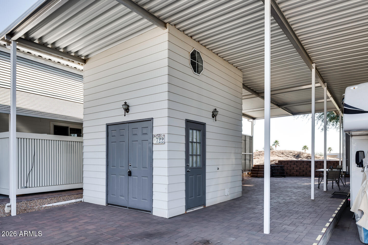 17200 West Bell Road, Unit 722 Surprise, AZ 85374 - Photo 2 of 19 a view of a porch with furniture