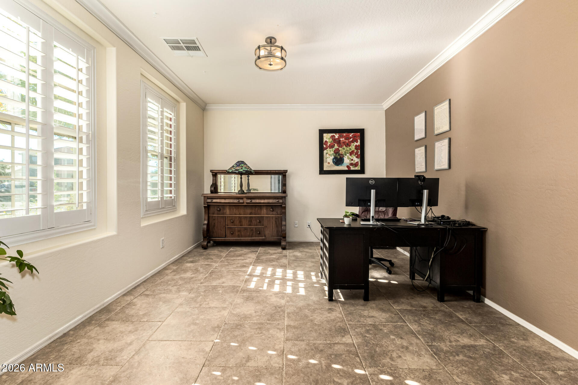 2858 East Shannon Street Gilbert, AZ 85295 - Photo 27 of 35 a view of a workspace with furniture and a window